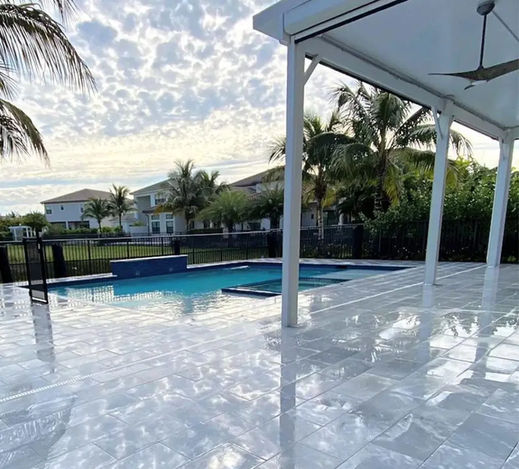 Sealed marble pool deck with covered patio